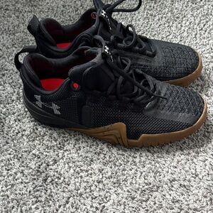 Under Armour Black training Shoe size men 7/women 8.5 never worn